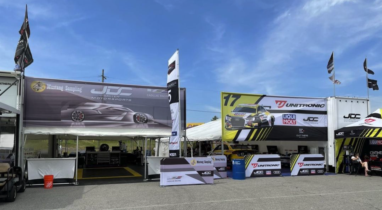 Out There Brands Custom Branded Motorsport banner awnings flags crowd barriers and canopies for JDC Miller Motorsports